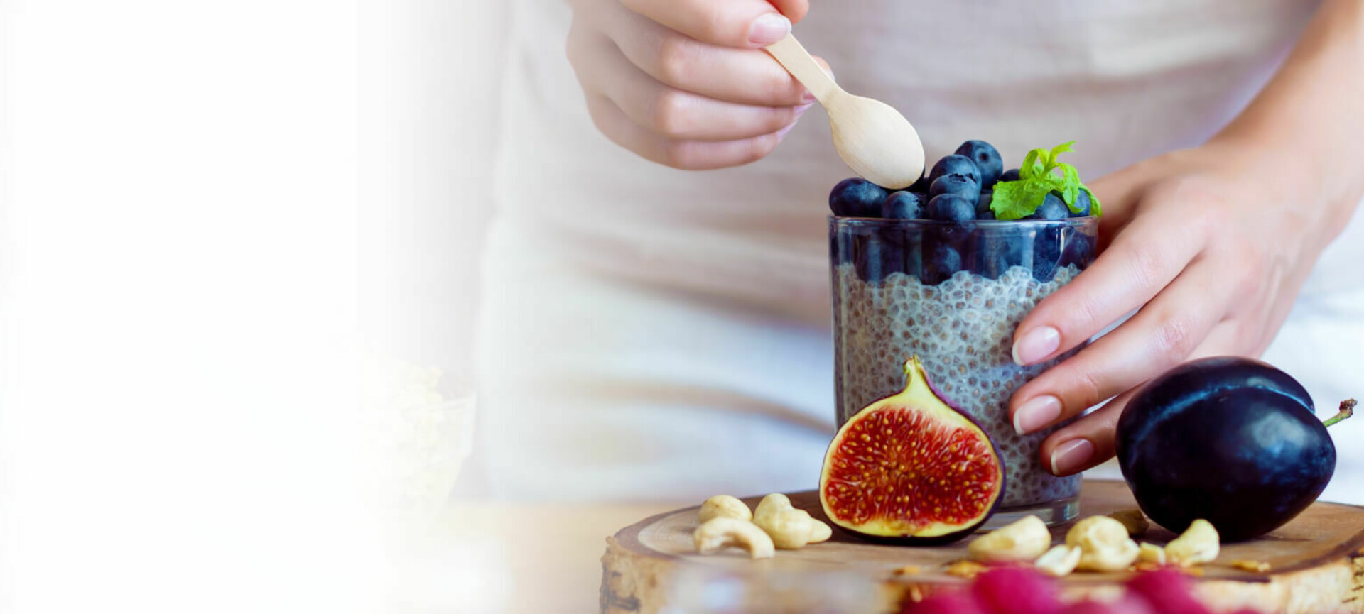 woman making smoothie