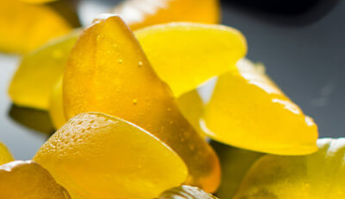 close up of yellow nutritional gummies