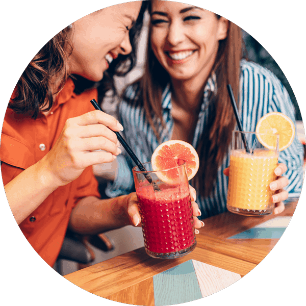 happy women drinking juice