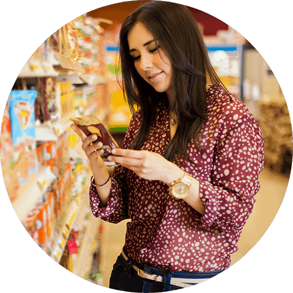 woman shopping in grocery aisle