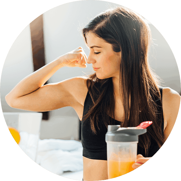woman flexing arm muscle
